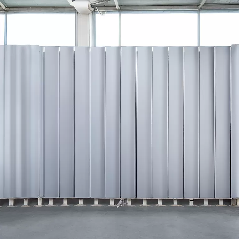 How do PVC partition panels improve pen hygiene and disease control